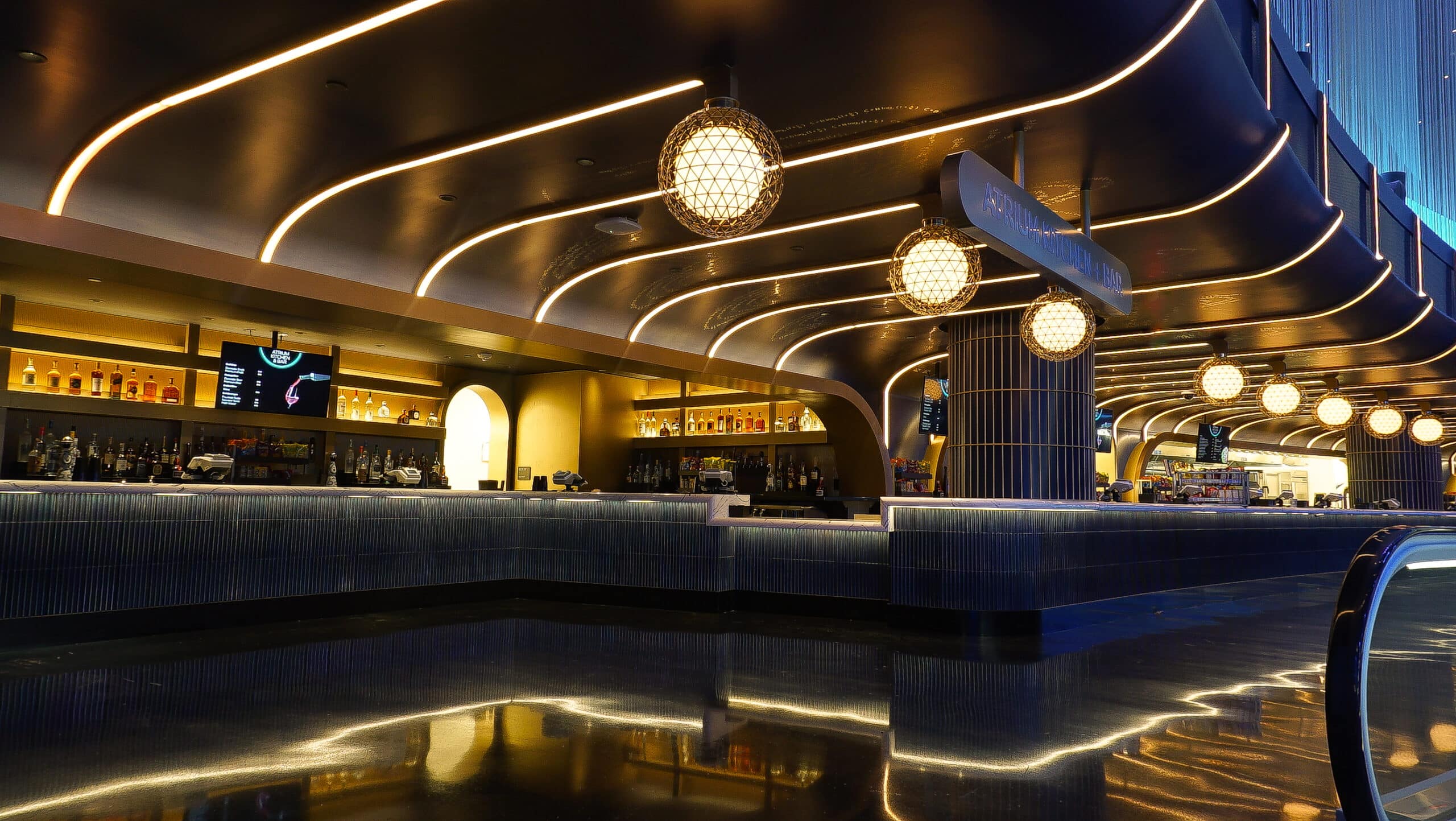 Modern bar interior with glowing geometric lights